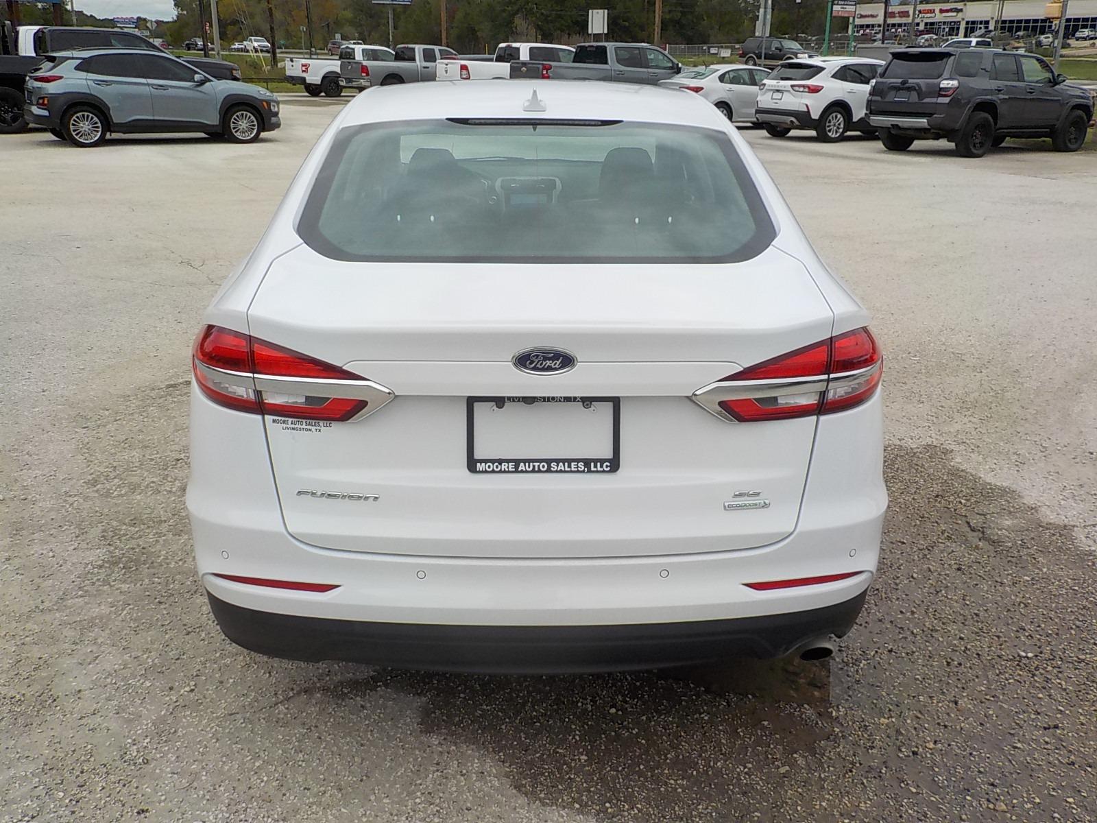 2020 White /Black Ford Fusion SE (3FA6P0HD1LR) with an 1.5L L4 DOHC 16V engine, 6A transmission, located at 1617 W Church Street, Livingston, TX, 77351, (936) 327-3600, 30.710995, -94.951157 - Photo #6
